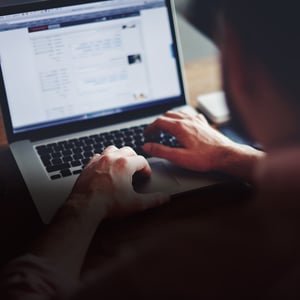 Person using computer. 