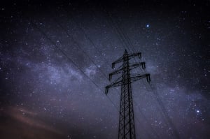 Power line in night time sky. 